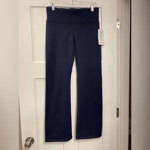 NWT navy blue Athleta altitude pant in polertec power stretch. Size medium.